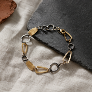 Bracelet à maillons dorés et argent oxydé